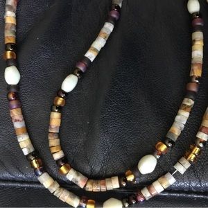 New high end beaded necklace approximately 20” long. Unisex.  Never worn or used